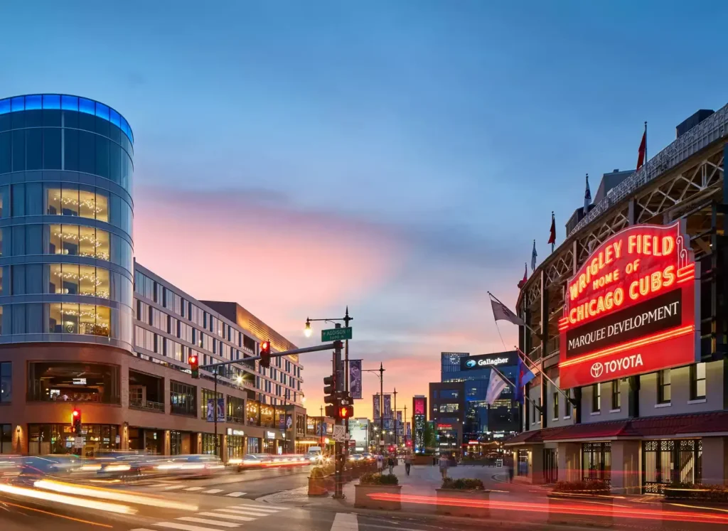 Sunset Picture of speeding traffic, next to the Marquee Development Building and Wrigley Field